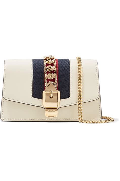 gucci sylvie mini chain embellished leather shoulder bag|gucci shoulder bag designer.